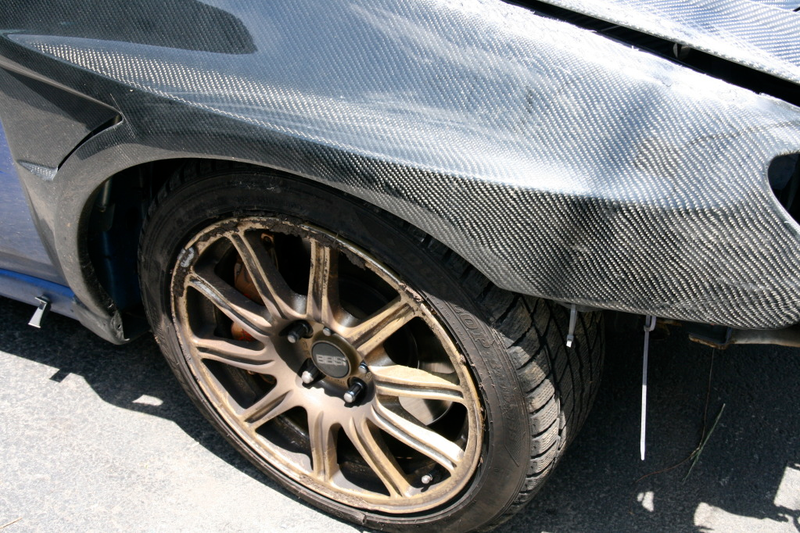 Illustration for article titled Subaru STI Hits Two Trees At Speed, Flips Twice, Everyone Survives!
